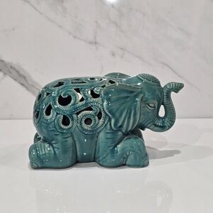 Beautiful Urban Trends Ceramic Laying Turquoise Elephant. Trunk Up Good Luck